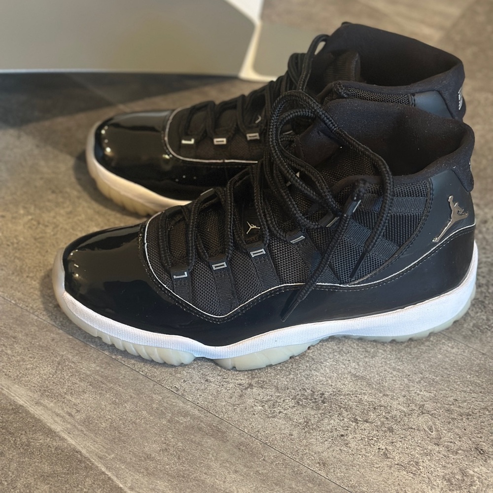 Jordan Air 11 Retro Black and White Sneakers - Picture 4 of 6
